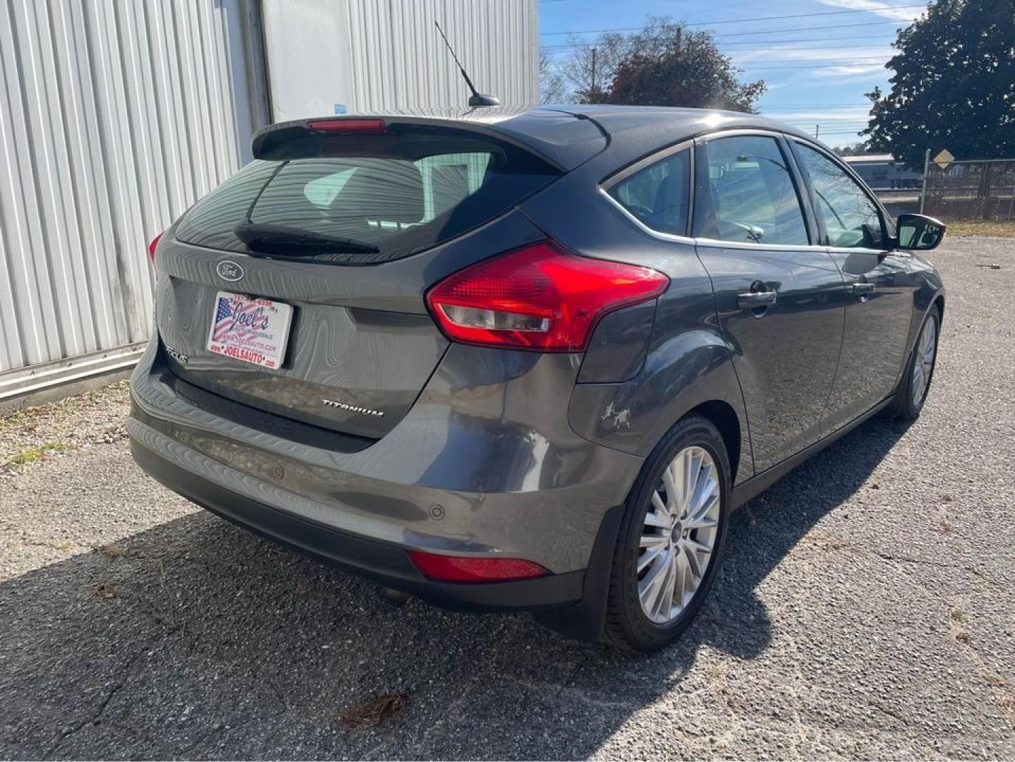 2015 Grey /Black Ford Focus Titanium (1FADP3N26FL) with an 2.0 4 CYL engine, Auto transmission, located at 5700 Curlew Drive, Norfolk, VA, 23502, (757) 455-6330, 36.841885, -76.209412 - Photo#2